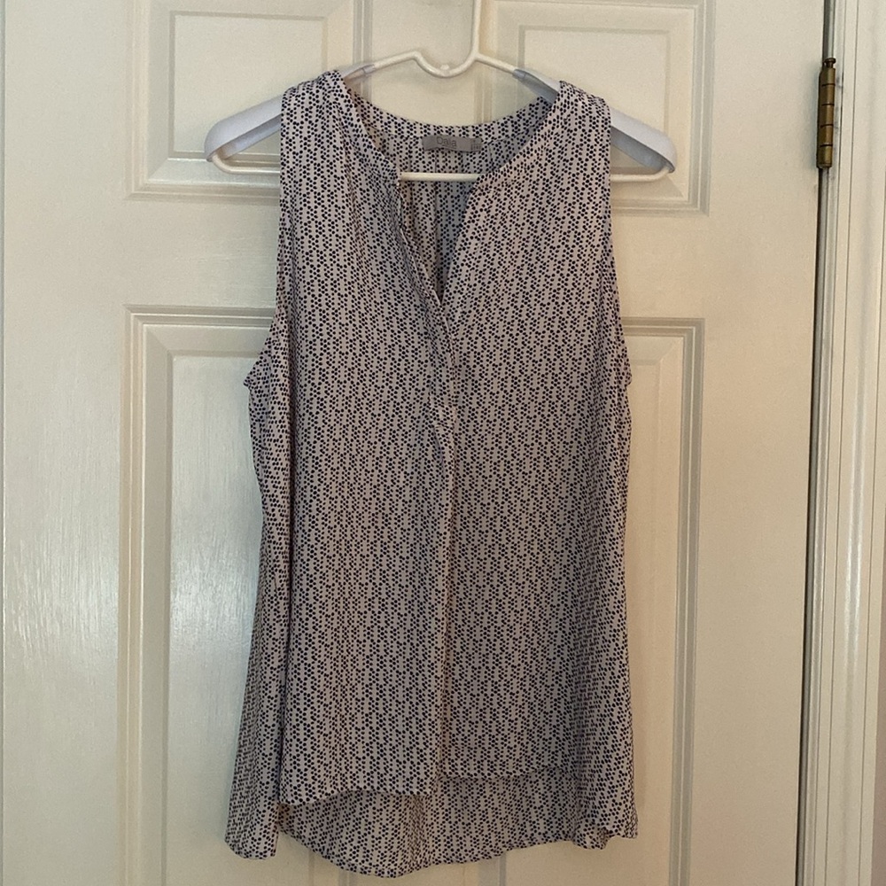 SLEEVELESS TUNIC BLOUSE